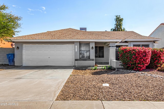 single story home with a garage