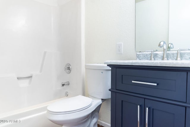 bathroom with toilet, shower / bath combination, and vanity