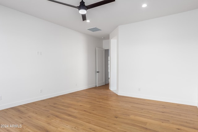 unfurnished room featuring ceiling fan and light hardwood / wood-style flooring