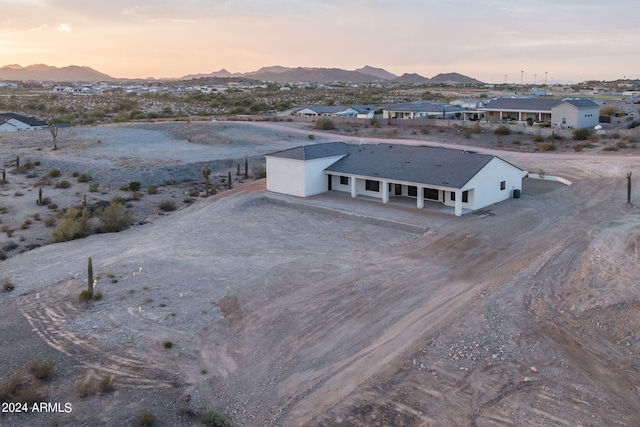 aerial view at dusk with a mountain view