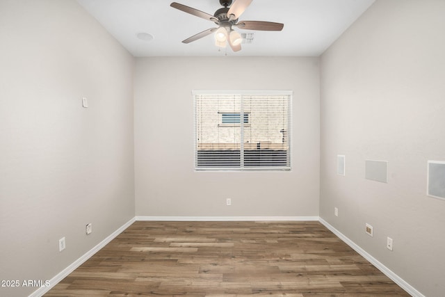 unfurnished room featuring ceiling fan and wood-type flooring