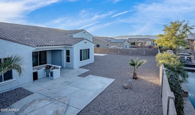 exterior space featuring a patio area and area for grilling