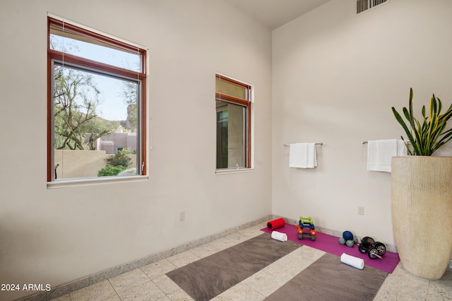 interior space with visible vents and baseboards