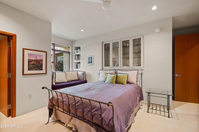 carpeted bedroom featuring recessed lighting and baseboards