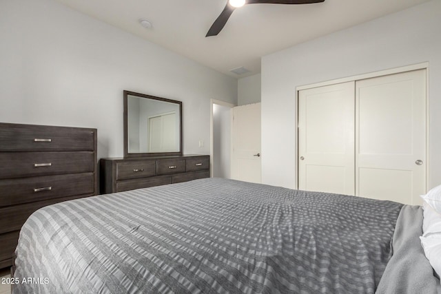 bedroom featuring a closet and a ceiling fan