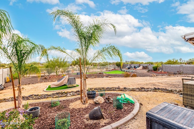 view of yard with a fenced backyard