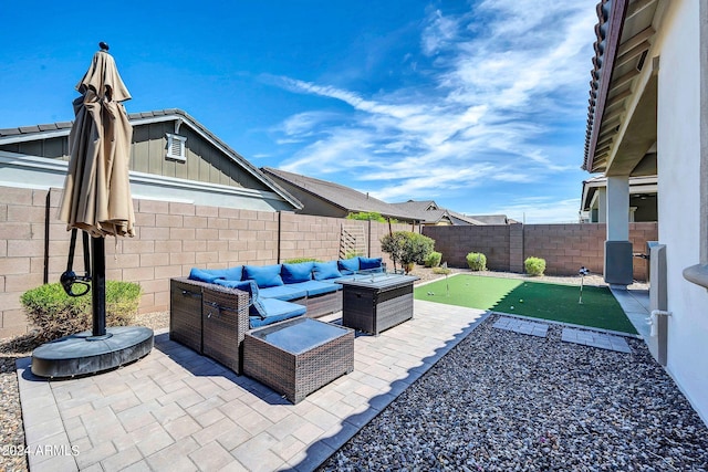 view of patio / terrace with a fenced backyard and outdoor lounge area