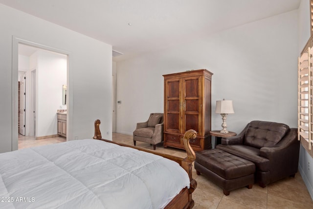 8689 E Krail St, Scottsdale, AZ 85250 - bedroom featuring light tile patterned floors and ensuite bath