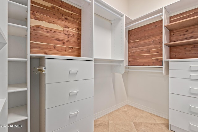8689 E Krail St, Scottsdale, AZ 85250 - walk in closet featuring light tile patterned floors