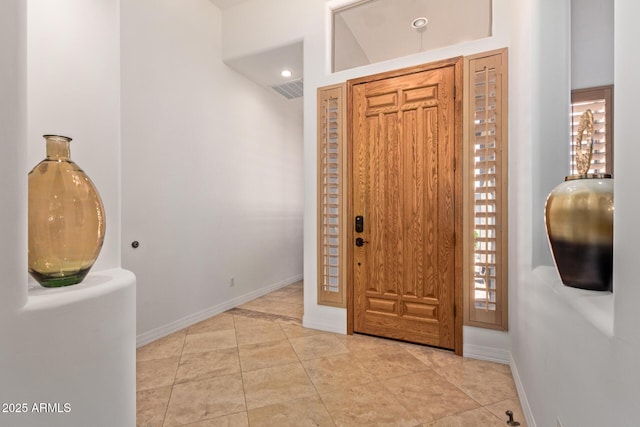 8689 E Krail St, Scottsdale, AZ 85250 - foyer entrance with light tile patterned floors and recessed lighting