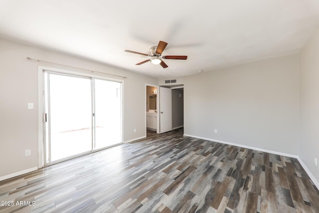 4833 N 63rd Ln, Phoenix, AZ 85033 - spare room featuring ceiling fan and wood finished floors