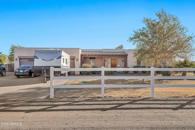 view of front of property with a garage