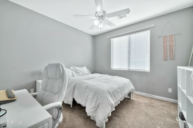 carpeted bedroom featuring ceiling fan