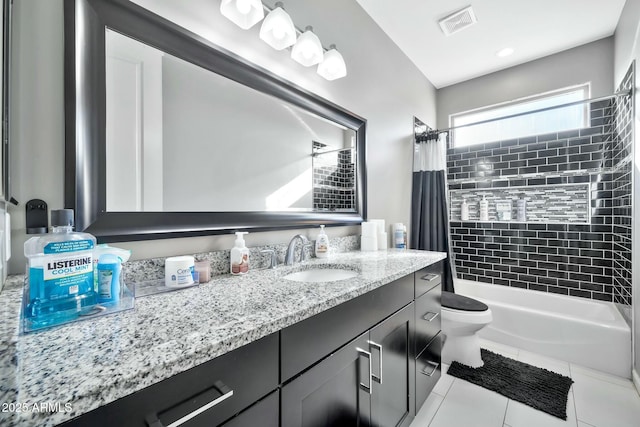 full bathroom with tile patterned floors, vanity, toilet, and shower / tub combo