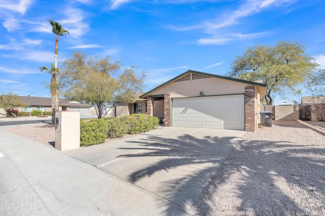 ranch-style house featuring a garage