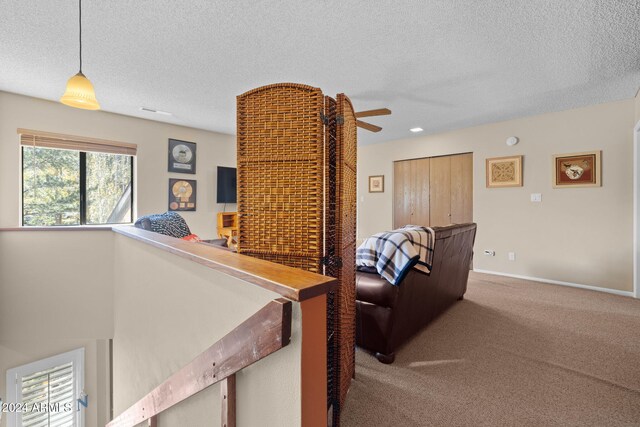 2900 N Saddleback Way Unit 9, Flagstaff, AZ 86004 - living area featuring a textured ceiling, carpet flooring, ceiling fan, and recessed lighting