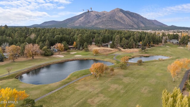 2900 N Saddleback Way Unit 9, Flagstaff, AZ 86004 - view of mountain backdrop with a large body of water and a local golf course