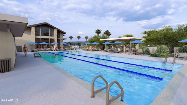 community pool with fence and a patio