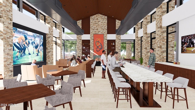 common area featuring high vaulted ceiling