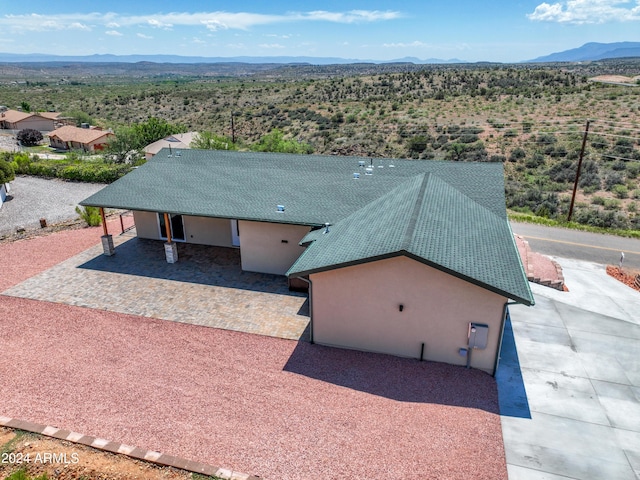 drone / aerial view with a mountain view