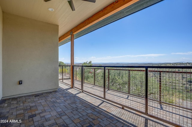 balcony featuring ceiling fan