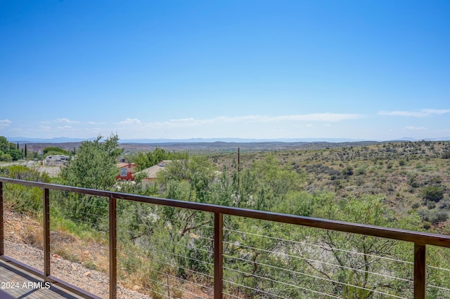 balcony featuring a mountain view