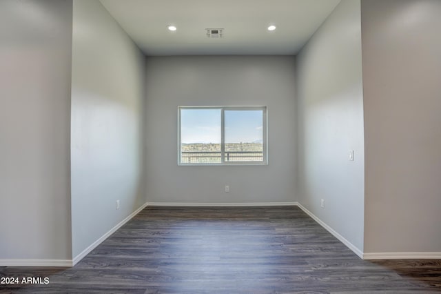 empty room featuring dark hardwood / wood-style floors