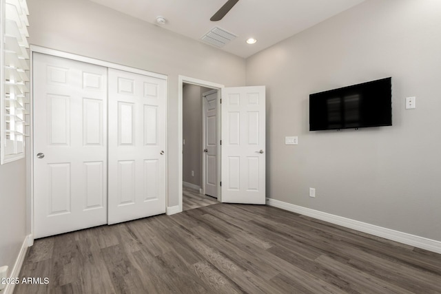 5407 S Tatum Ln, Gilbert, AZ 85298 - unfurnished bedroom with baseboards, wood finished floors, a closet, recessed lighting, and ceiling fan