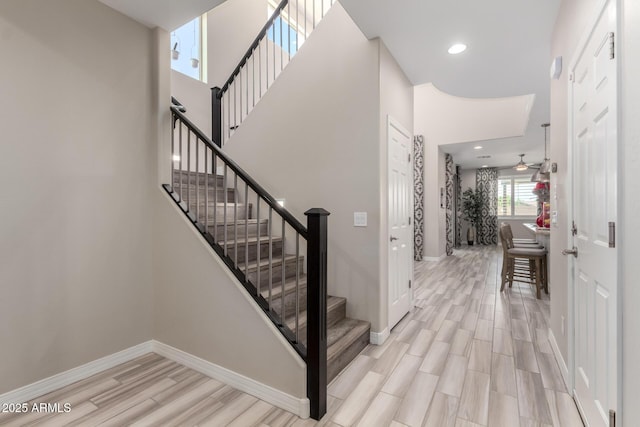 5407 S Tatum Ln, Gilbert, AZ 85298 - stairway featuring wood finished floors, baseboards, and recessed lighting