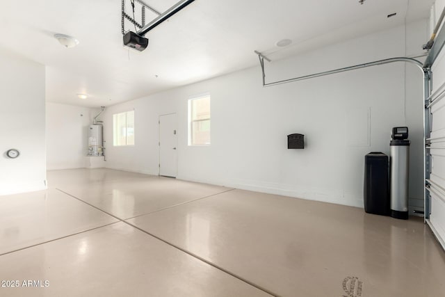 5407 S Tatum Ln, Gilbert, AZ 85298 - garage featuring water heater and a garage door opener