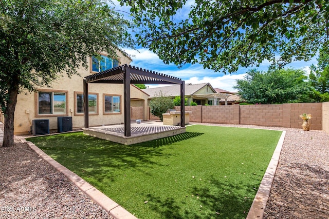 5407 S Tatum Ln, Gilbert, AZ 85298 - view of yard with a pergola, a wooden deck, and central AC
