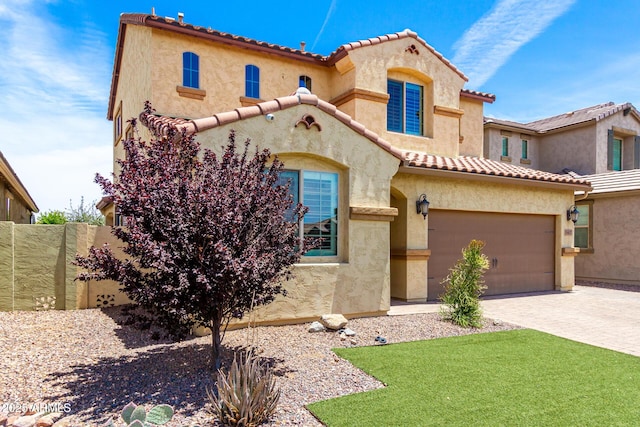 5407 S Tatum Ln, Gilbert, AZ 85298 - mediterranean / spanish home featuring a tiled roof, a garage, driveway, and stucco siding