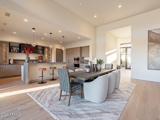 dining room featuring light wood-type flooring