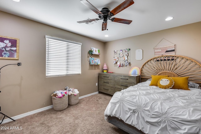 carpeted bedroom with ceiling fan