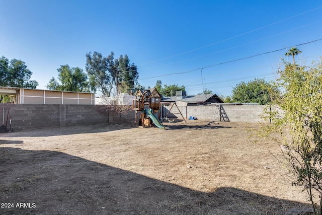 view of yard with a playground