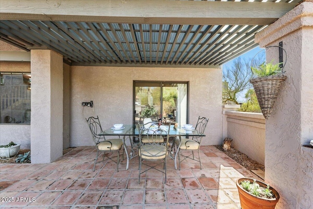 view of patio / terrace with outdoor dining area and a pergola