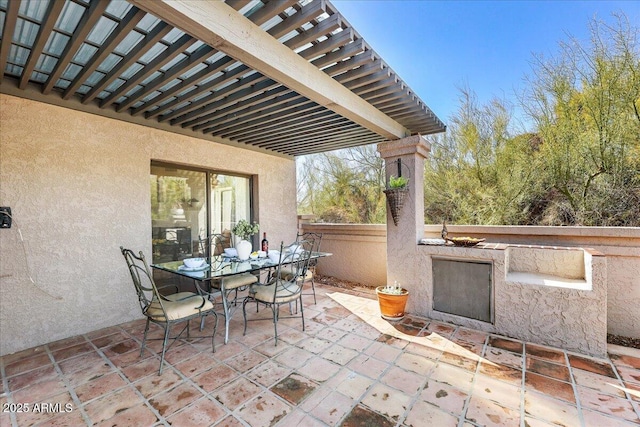 view of patio / terrace featuring outdoor dining space and a pergola