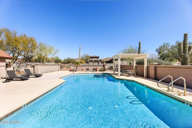 view of pool with a fenced in pool, a patio, and a pergola