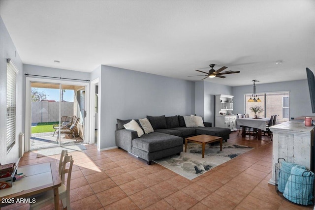 tiled living room with ceiling fan