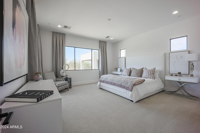 bedroom featuring carpet floors, baseboards, visible vents, and recessed lighting