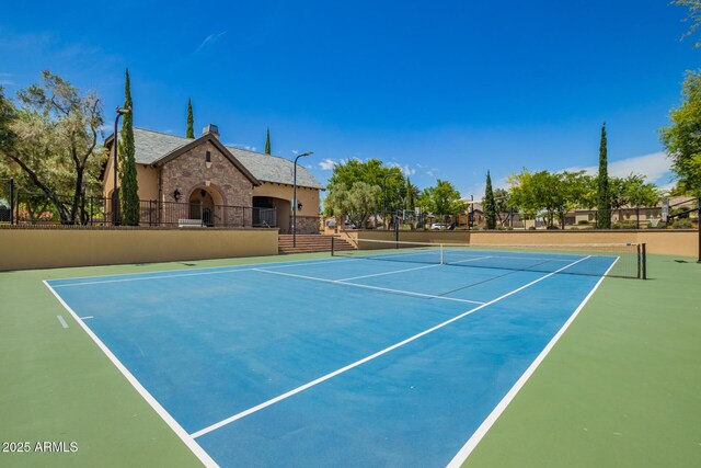 view of sport court featuring community basketball court and fence