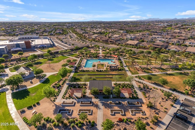 birds eye view of property with a mountain view and a residential view