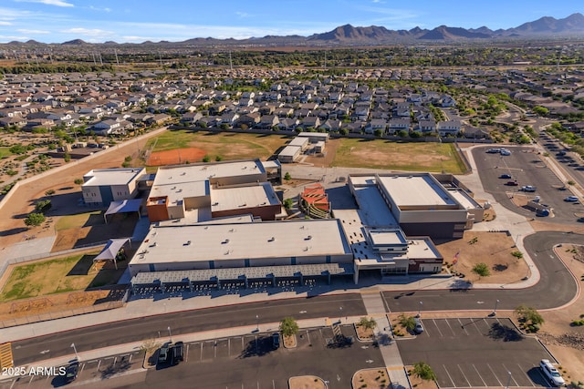 birds eye view of property with a residential view and a mountain view