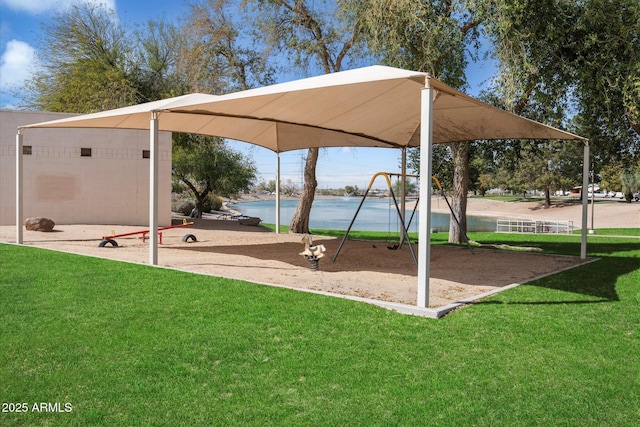 11421 W Lakeshore Dr, Youngtown, AZ 85363 - surrounding community featuring playground community, a water view, and a yard