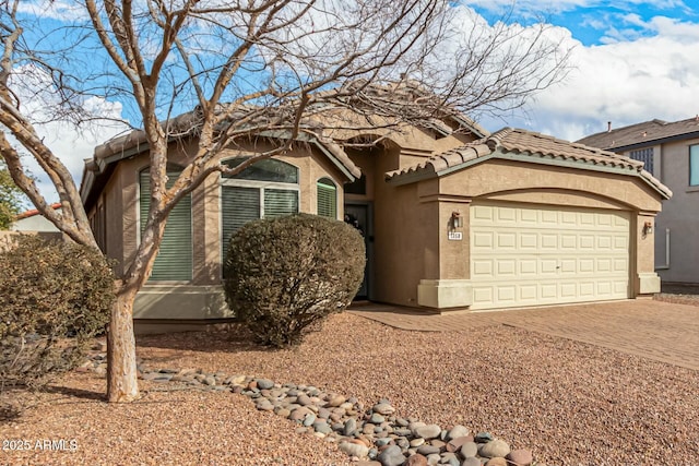 view of front of house with a garage