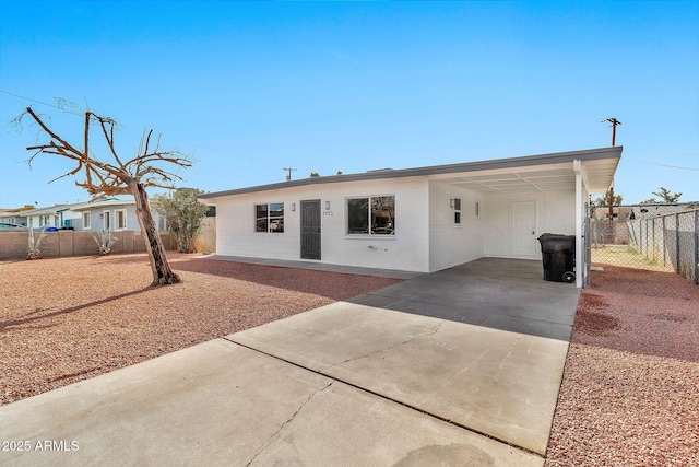 view of front of home with a carport