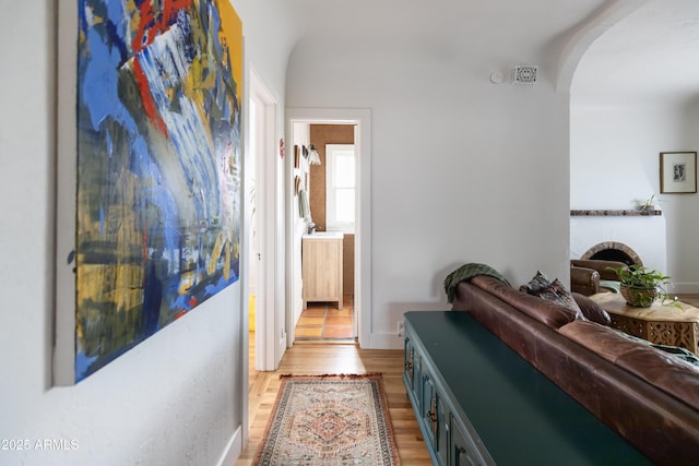 hallway featuring light wood-type flooring