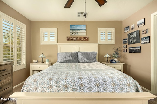 carpeted bedroom featuring ceiling fan