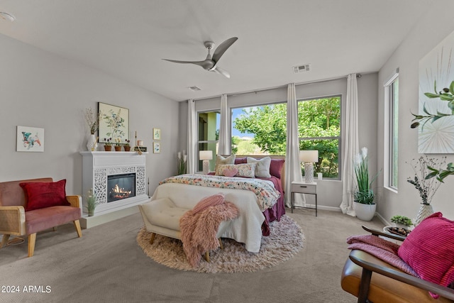 carpeted bedroom featuring ceiling fan