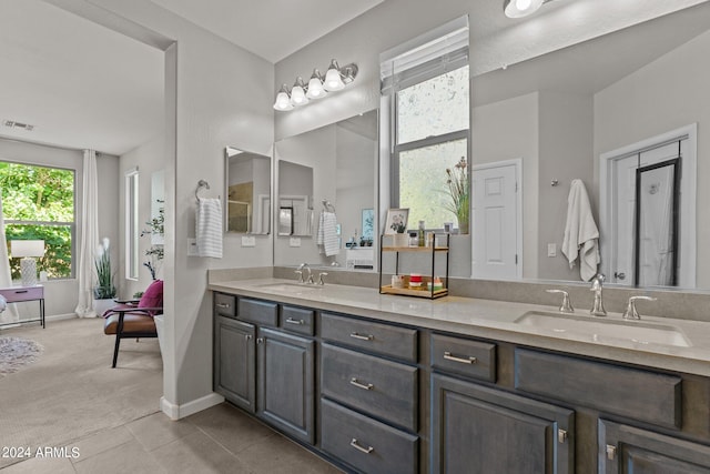 bathroom featuring vanity and tile patterned flooring